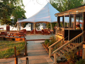 outdoor tent and seating on lake Gaston